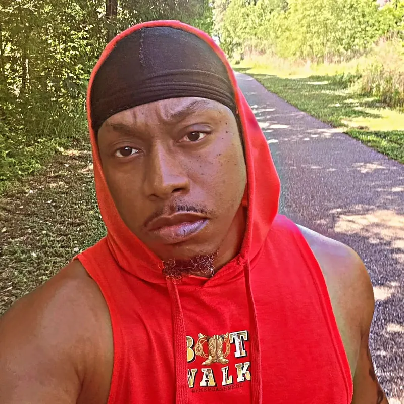 Prep Cashmere wearing the red BOOTWALK hoodie